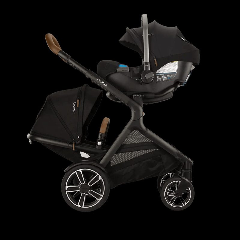 nuna demi next double stroller rider board caviar traveling tikes 3